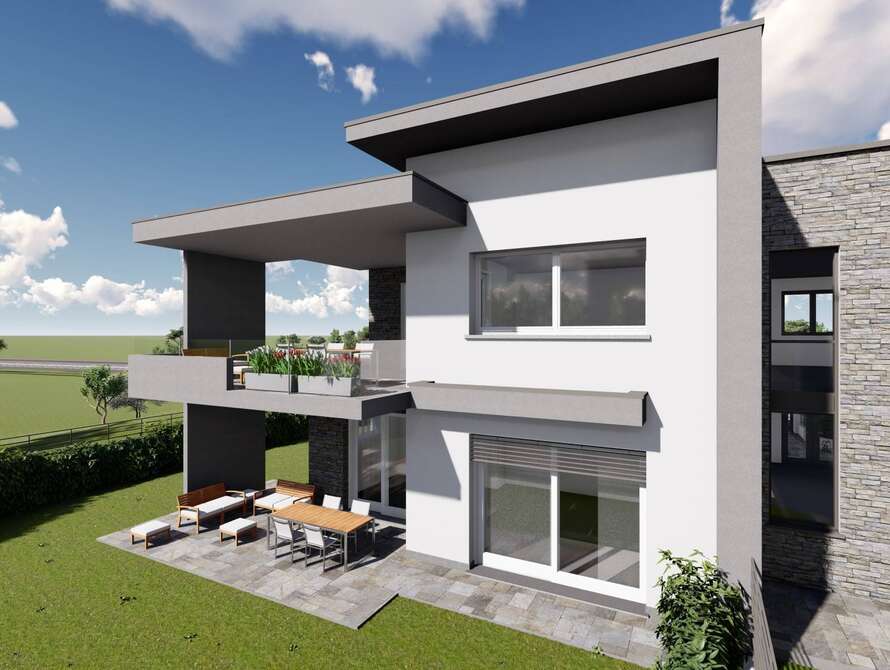 appartamento di tre locali con doppi servizi portico e giardino di mq 121