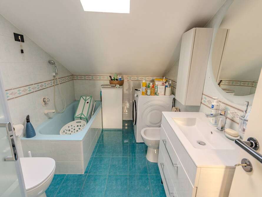 mansarda di 3 locali a solaro